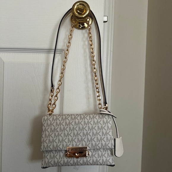 Michael Kors Handbags - Michael Kors Cream and Gold Crossbody Bag